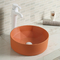 سینک حمام گرد سرامیکی صاف روی میز رومیزی سینک ظرفشویی نارنجی